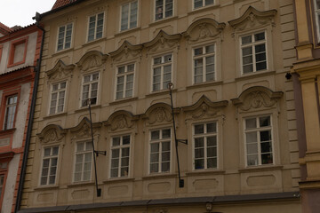 Fototapeta premium The facade of a historical building showcases beautiful windows and features that highlight its significance