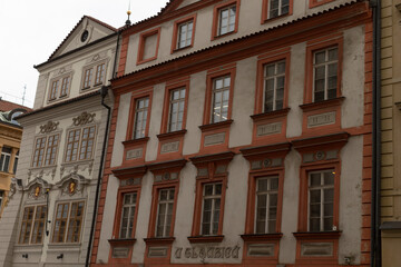 Historic building facades showcase diverse architectural styles, enhancing urban street character and charm