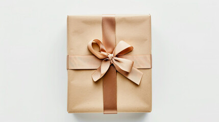 Gift box tied with a satin ribbon isolated against a white background.