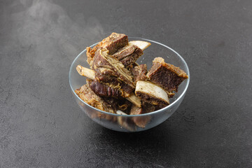 Hot beef ribs in glass bowl