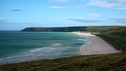 A spectacular sand beach and the turquoise sea in the north of Scotland. Isle of Lewis, Scotland. Vacation holiday banner