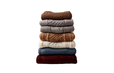 Pile of warm, knitted wool sweaters or pullovers, isolated on a transparent background. Soft, comfy winter and fall clothes.