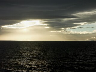 Dramatic Seascape with Sunlight Breaking Through Clouds - Antarctic Sound