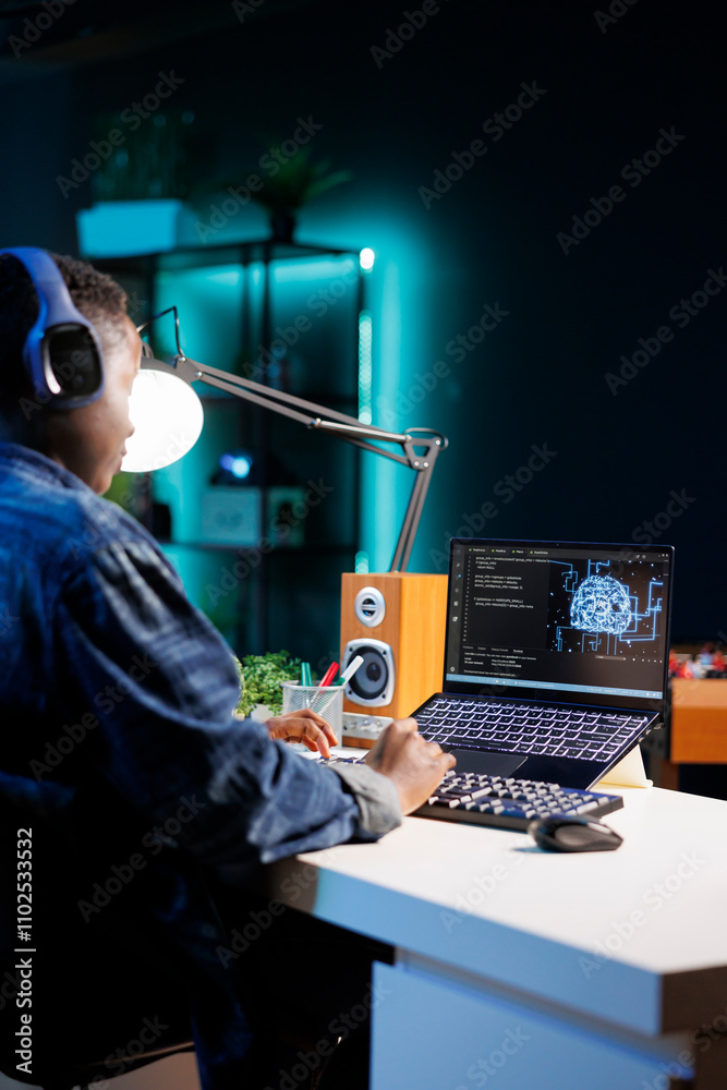 Poster female developer using headphones while coding on a laptop with a blue interface showing a neural ne