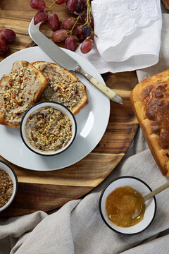 Pate and Brioche savoury starter on a wooden board