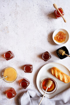 Selection of Australian honey, including Yellowbox, Ironbark, Macadamia, Rainforest, Tea Tree, Manuka, Creamed Honey and Honeycomb.