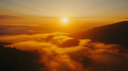 Golden Sunrise Over Misty Mountain Landscape