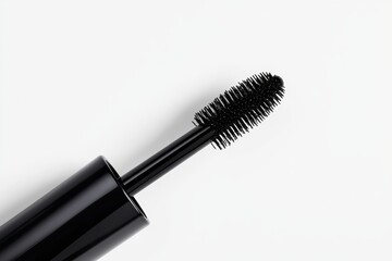 A black mascara wand with a black brush