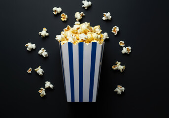 Fresh popcorn in a paper box ready for a movie night snack