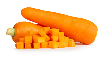 Side view of orange carrot roots with slices or pieces in cube shape in stack isolated on white background with clipping path