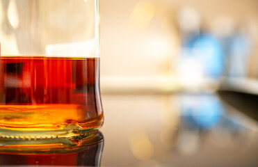 Premium Whiskey Bottle Close-Up: Capturing the Rich Amber Color and Reflections for Culinary and Beverage Photography Enthusiasts