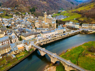 Picturesque view of French medieval village Estaing on Lot river