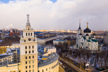 Fototapeta premium Cathedral of the Annunciation and the clock tower of the South-Eastern Railway building frome drone in Voronezh, Russia