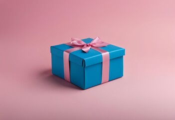 a blue gift box with a matching pink ribbon for a celebration setup