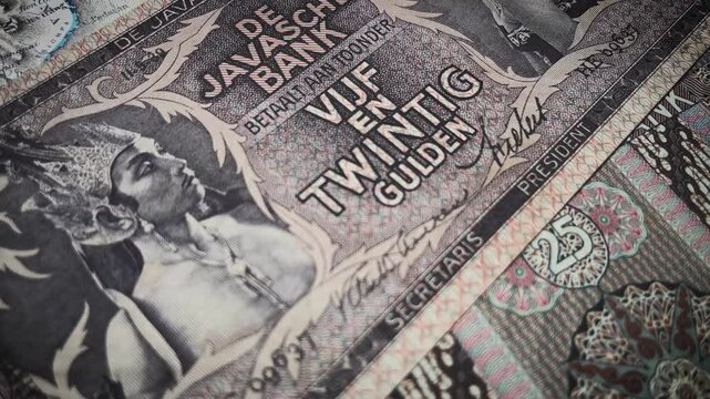 25 guilder banknotes circulating in Indonesia during the Dutch colonial period.