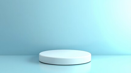 A Single White Cylindrical Platform Against A Light Blue Background