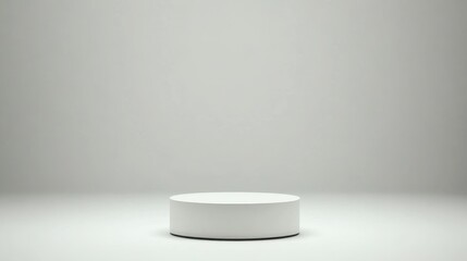 White Cylindrical Pedestal In A White Room