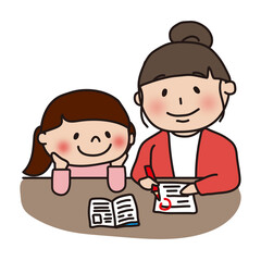 娘の勉強の採点をするママ