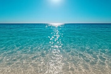 Obraz premium A serene aqua background featuring soft ripples of water with sunlight reflecting off the surface