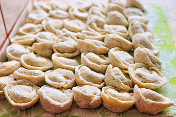 Homemade handmade dumplings, ready to be cooked.