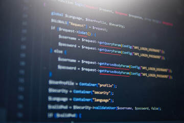 Code In Focus: A close-up shot of a computer screen displaying lines of code, highlighting the intricate details of software development. The image captures the essence of programming.