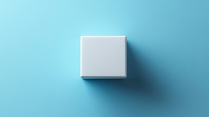 The simple and elegant white gift box is centered on a light blue background with clean edges, presenting a modern minimalist aesthetic. Balanced composition, soft lighting, and delicate shadows