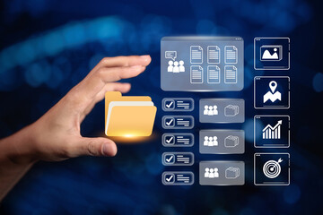 A hand holding a digital folder icon, with file management and data analysis icons in the background, symbolizing digital document organization and data processing.