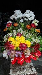 bouquet of flowers on a black