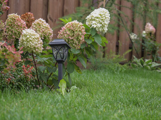 garden house gartense. the decor of the relaxation area with sunbed in the garden. Garden decor in summer. Chill zone