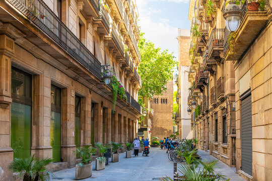 One of the historic alleys and streets of shops and apartments in the El Born Gothic quarter of the Catalonian city of Barcelona. 