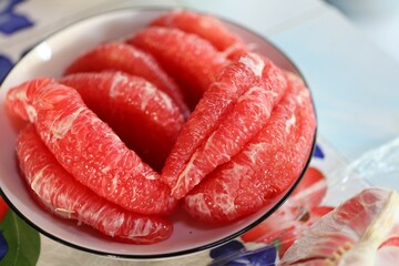 Close-up of red pomelo, organic fruit, good for health