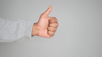 man hand showing a thumb-up 