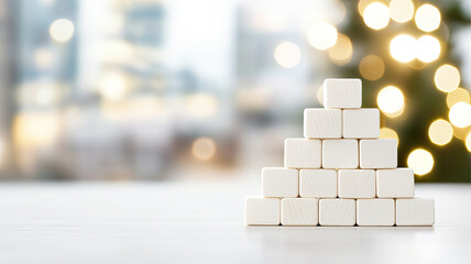 Stacked white blocks with bokeh lights in background