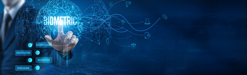 Businessman touching Biometric icon on virtual interface, security system, data authentication...