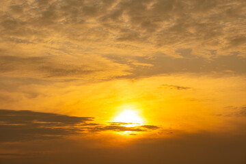 Enjoy a panoramic view of the skyline. The sun rises in the morning sky with colorful clouds. and beautiful cloud patterns In the soft light of the morning	