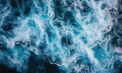 Aerial view to ocean waves. Blue water background