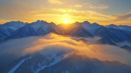 Obraz premium Majestic Sunrise Over Snowy Mountain Peaks