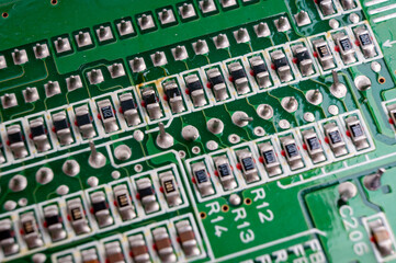 electronic circuit board with the back side, on which the soldering and connecting tracks of radio...