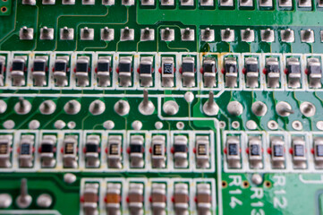 electronic circuit board with the back side, on which the soldering and connecting tracks of radio...