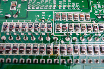 electronic circuit board with the back side, on which the soldering and connecting tracks of radio...