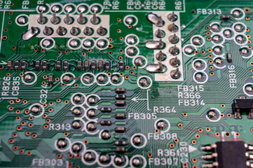 the back side of the electronic printed circuit board with the layout and soldering nodes