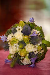 A vibrant bouquet of flowers in green and purple hues, perfect for any special occasion or celebration