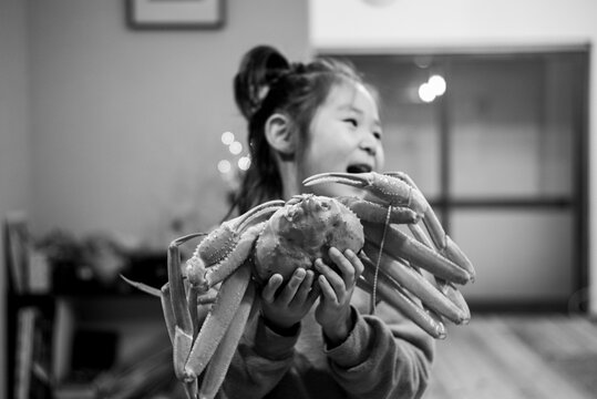 person holding a king crub