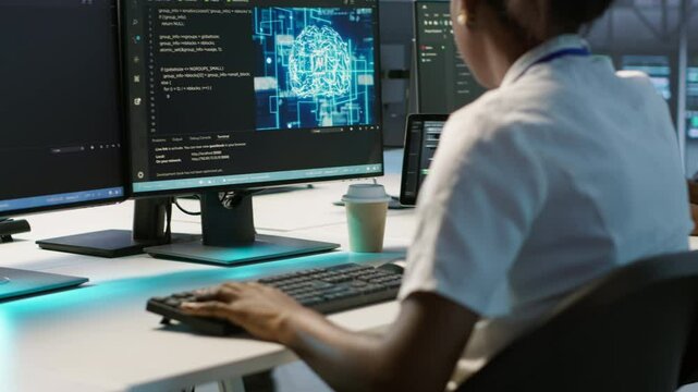 Engineer in data center implementing advanced AI driven predictive maintenance systems to proactively identify and resolve potential hardware failures before they impact operations, camera A