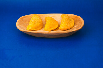 Delicious traditional Colombian empanadas with spicy sauce