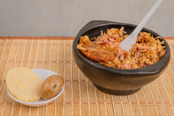 Typical lechona from Tolima with rice