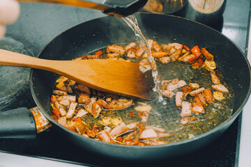 Cooking Ingredients for Peperoncino in a Frying Pan
