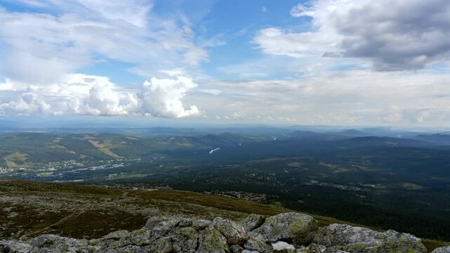Time-lapse footage of the clouds moving over Trysilfjellet mountain peak in Trysil, Norway