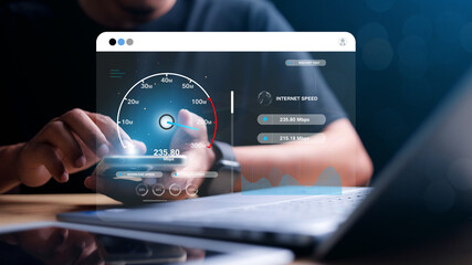 Fototapeta premium Fast internet connection with Metaverse technology concept, Programmer people working laptop with Virtual screen of Internet speed measurement, Internet and technology concept, 6G High-speed internet