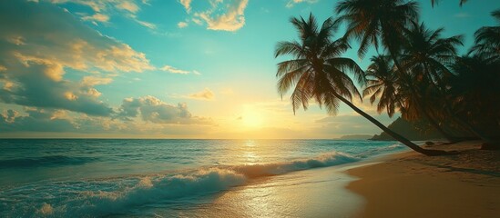 Serene beach sunset with palm trees and gentle waves under a vibrant sky creating a tranquil summer atmosphere